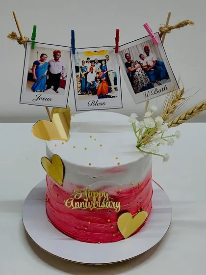 This anniversary cake features a charming clothesline of family photos, adding a wonderfully personal and rustic touch. The cake itself is my fusion Rose Pistachio flavour with a pink ombre finish.
