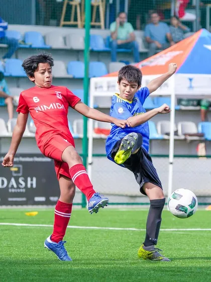 A fierce tackle during the DPDL Super Cup. Our players are taught to be strong but fair.