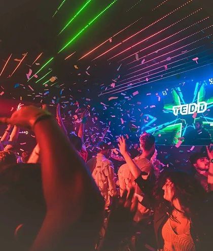 The confetti cannon goes off, showering the dance floor. These are the moments of pure joy and celebration I live to create.