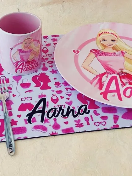 For the Barbie girl, this personalised dinner set is a must have. The plate, mug, and placemat are all decked out in a fun Barbie theme with the name 'Aarna'.