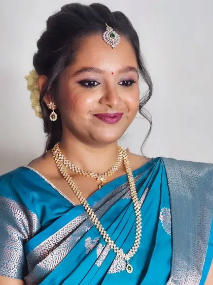 Jebha's engagement glam! We went for a beautiful look with a pop of color on the lips and shimmery eyes, paired with a simple yet elegant hairstyle.