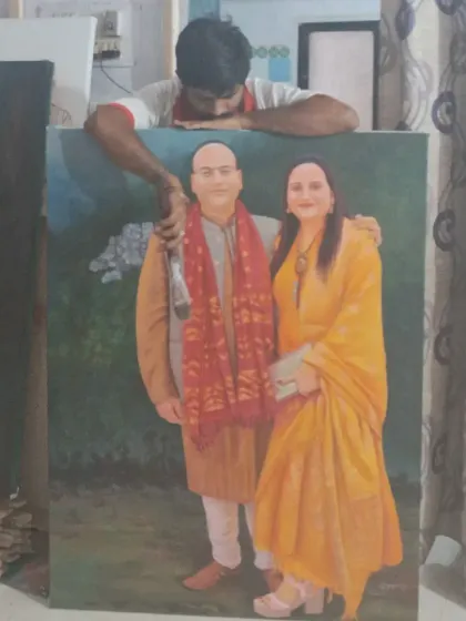 Here I am with a completed 48"x36" couple portrait in my studio. Working on a larger scale allows for a greater depth of detail and creates a significant, impactful piece for a client's home.
