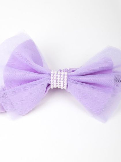 A close-up of the lavender tulle bow headband.