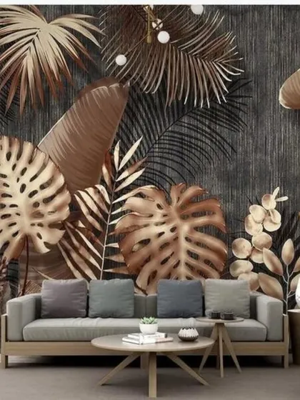 A sophisticated tropical wallpaper with bronze and brown leaves on a dark, textured background.