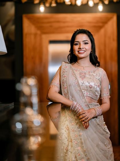 This bride's engagement lehenga was a beautiful shade of off-white. I created a soft and romantic makeup look with a dewy finish to give her an ethereal glow.