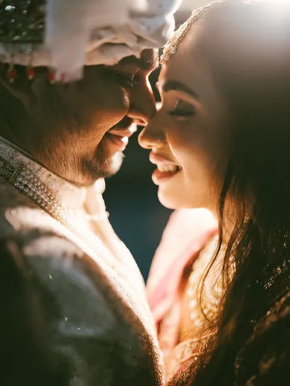 The purest joy is found in the in-between moments. This close-up captures the uninhibited smiles and gentle connection that define a relationship, bathed in a soft, romantic light that feels both intimate and cinematic.
