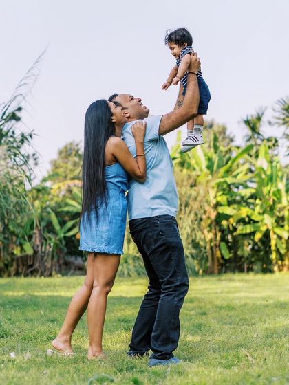 Flying high. I believe sessions should be fun, not forced. We play, we run, and we capture the genuine joy that comes from a father lifting his son towards the sky.