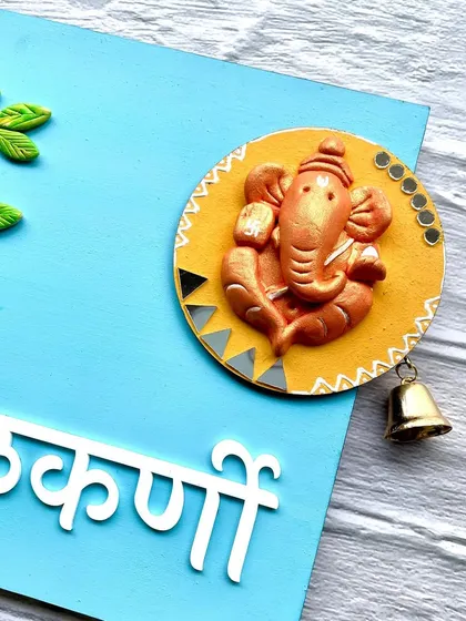 A close-up of the Ganesha and bell detail, a popular customization request from my clients.