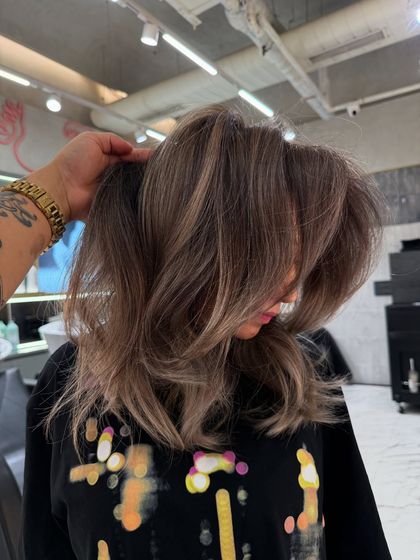 A beautiful blonde transformation that adds so much brightness and volume. The layers and color work together to create a full, dynamic style.