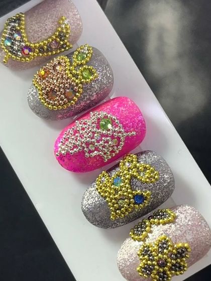 Another angle of the crystal bead designs, showing the texture and sparkle of this unique technique.