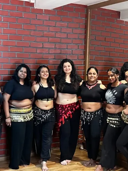 This is my squad, my Team Azaya! This picture captures the excitement and sisterhood we share just before hitting the stage. There's always something big and exciting happening here, and we do it all together.