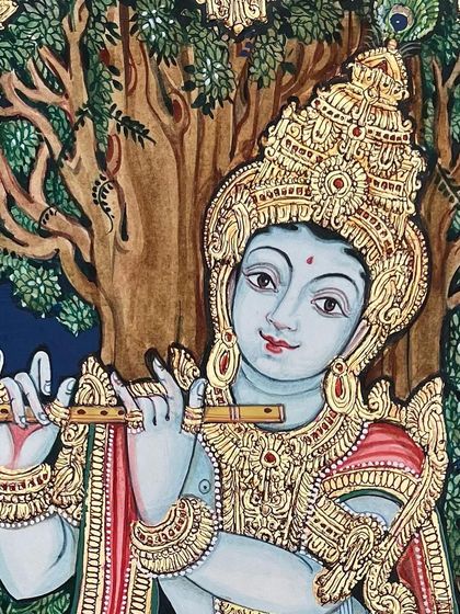 A close-up of Lord Krishna's face from one of our paintings, showcasing the serene and engaging expression that is a hallmark of our work.