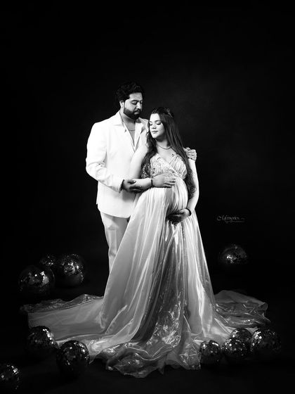 Capturing the essence of love, anticipation, and togetherness in a timeless black and white frame.