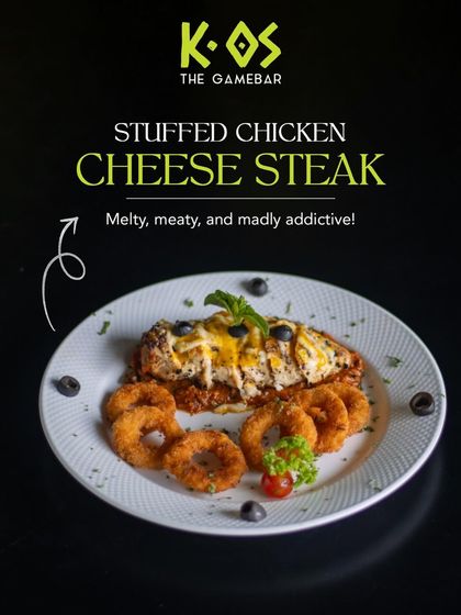 Melty, meaty, and madly addictive. This Stuffed Chicken Cheese Steak is pure comfort food, served with crispy onion rings.