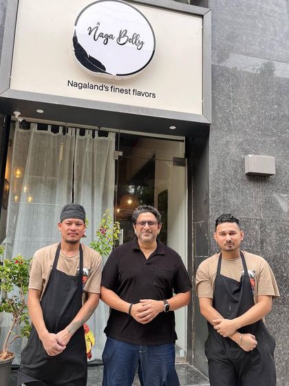 Our chefs standing proudly with Arshad Warsi outside our restaurant. This was a moment of immense pride not just for us, but for the entire Naga community.