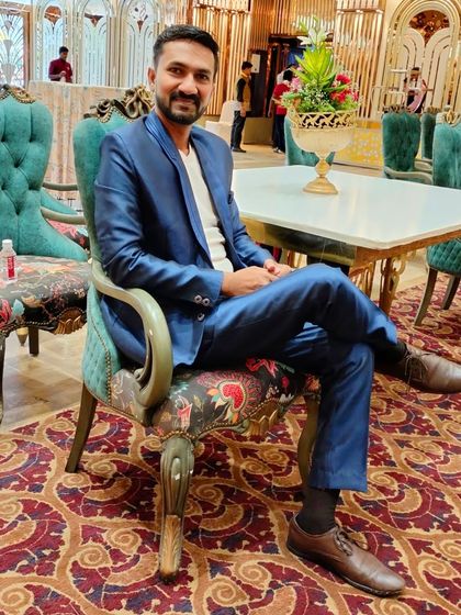 Taking a moment to relax at the beautifully decorated venue in Amravati before the 95th birthday show began.