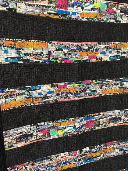 A close-up of the graffiti fabric strips.