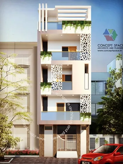 This residential building in Begusarai, Bihar, features a narrow facade with perforated jali screens. These screens provide privacy and ventilation while adding a decorative, modern element to the exterior.