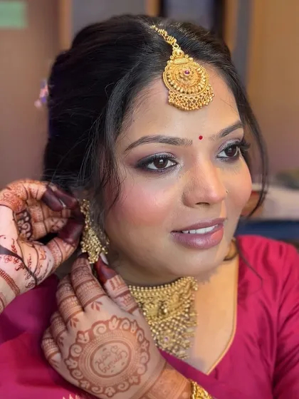 A close-up of the final touches. The henna and traditional jewelry complete this beautiful baby shower look.