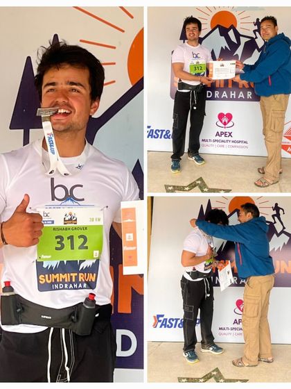 Receiving my medal and certificate for the Indrahar Pass Summit Run. A proud moment after 12 hours of non-stop effort.