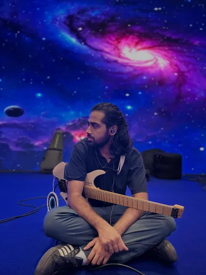 Our guitarist chilling on stage before the Godrej show. The calm before the storm of a high-energy performance.