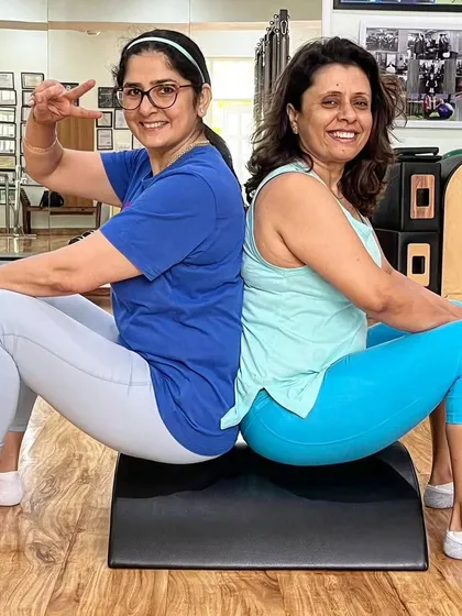 Partner work is a great way to connect and have fun. Here we are, supporting each other back-to-back.