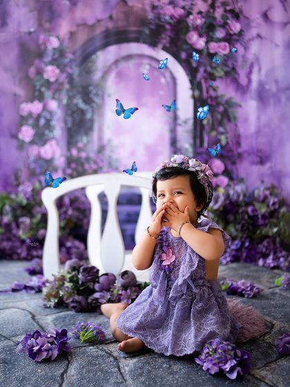 A shy but sweet giggle in the middle of a magical purple garden. The falling butterflies add a touch of wonder.