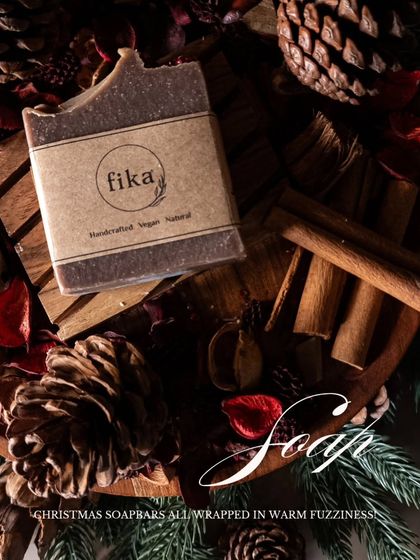 The 'boujee' fuzzy season is here. This image captures the essence of my holiday soaps, with a beautifully packaged bar resting among cinnamon sticks, pinecones, and dried flowers, ready to turn your shower into a luxurious escape.