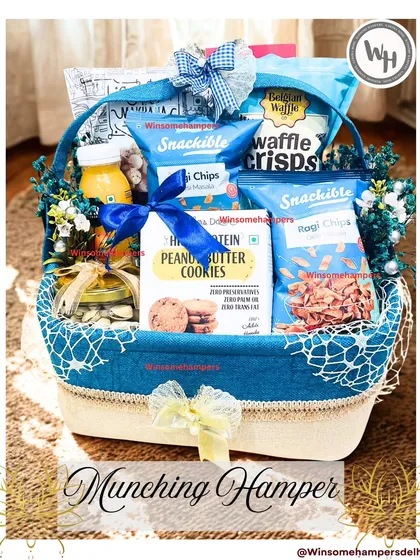 My 'Munching Hamper' is a step up, featuring healthier options like ragi chips and protein cookies alongside classic treats.