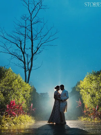 Embracing the magic of the monsoon, I use creative lighting to craft dramatic and romantic silhouettes. This shot is all about capturing the intimacy and passion of a couple against a powerful, atmospheric backdrop.