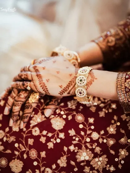 It’s all in the details. The intricate henna on a bride's hands, the stunning jewelry, the rich fabric of her lehenga. I believe these small details tell a big part of the wedding story.