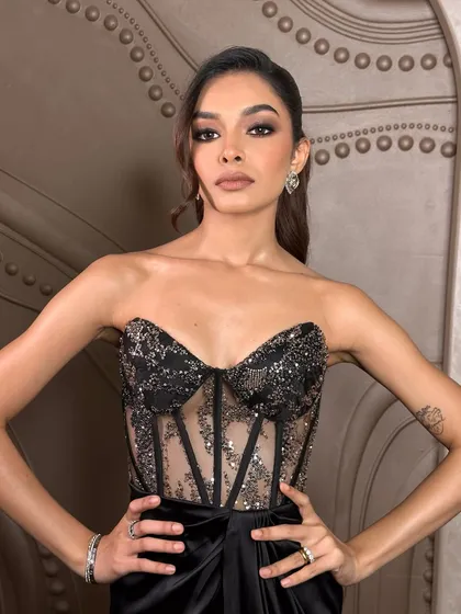 A powerful pose that matches the energy of the makeup. The bold eyes, snatched contour, and confident pout come together to create an unforgettable look.