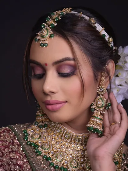 A beautiful bridal look with a focus on a pink and purple smokey eye.