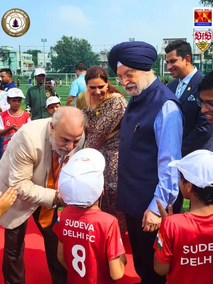 The honorable minister interacting with our youngest Sudevans. It is moments like these that ignite the dreams of our future stars.