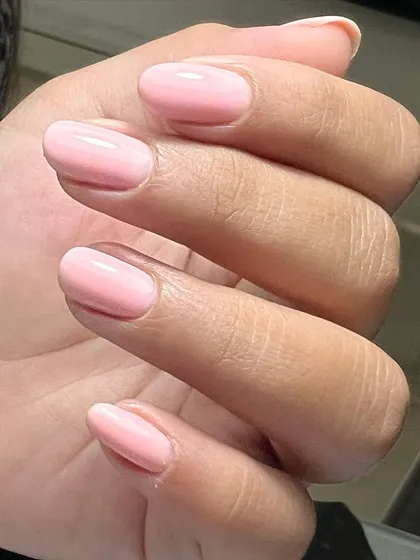 This is the "quiet luxury" look that so many clients ask for. A perfect Russian manicure followed by a sheer pink gel gives the nails a healthy, clean, and effortlessly elegant appearance.