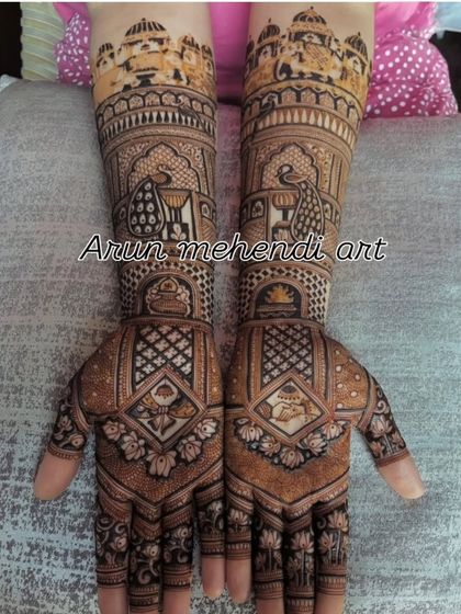 A beautiful symmetrical design featuring peacocks and lotus motifs inside geometric patterns, creating a balanced and elegant look.