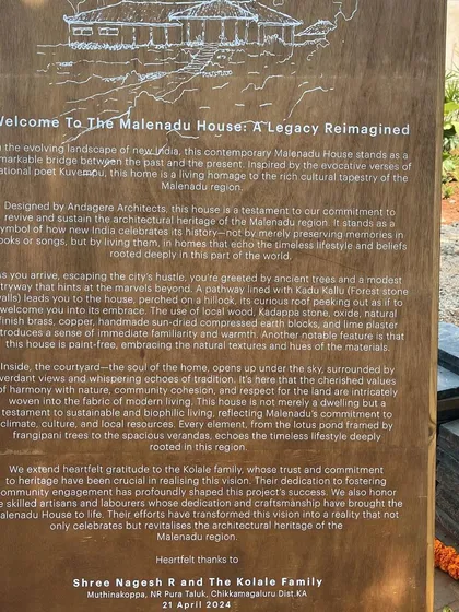 A welcome plaque for the Malenadu House, explaining the project's philosophy of reviving the region's architectural heritage for a contemporary lifestyle.