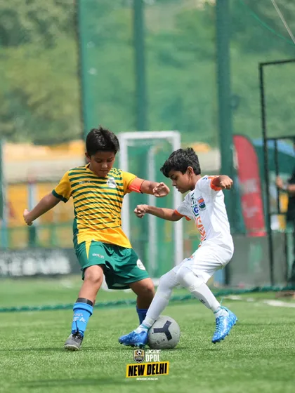 A one on one battle for the ball. Our training includes competitive drills that simulate real match pressure, sharpening players' defensive and offensive skills.