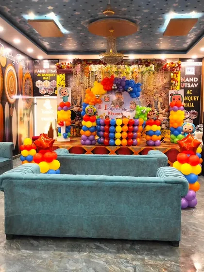 A wide view of the Cocomelon themed birthday party at Nand Utsav AC Banquet Hall. This shows how my decorations can fill a large space, including stage decor and seating arrangements.