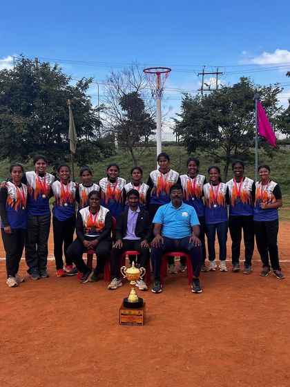 The complete girls' team and coaches after securing 3rd place in the 6th Junior State Level Netball Championship.
