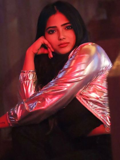 A rockstar style photoshoot. This image captures the confidence and edgy vibe I bring to my performances.