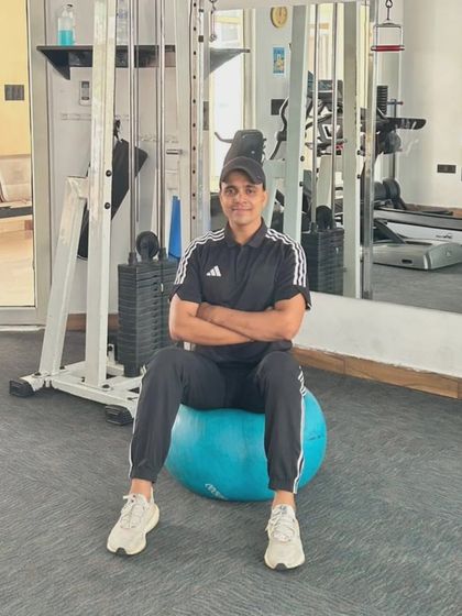 The stability ball is a versatile tool for core workouts. Here I am, ready to start a core training session in my Noida gym.