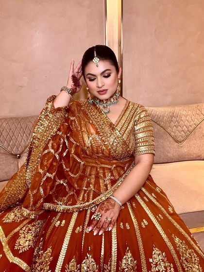 A seated portrait in my lehenga, feeling nostalgic and festive.
