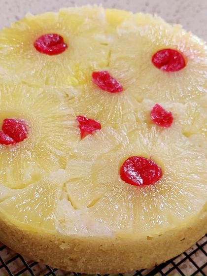 A closer view of the pineapple upside-down cake, showing the caramelized fruit topping.