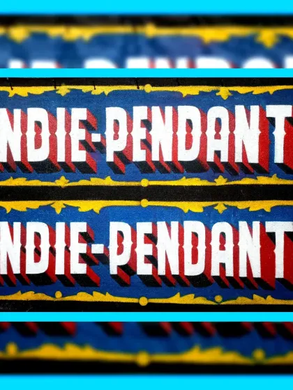 A close-up of the "Indie-Pendant" signs, focusing on the simple but effective 3D lettering.
