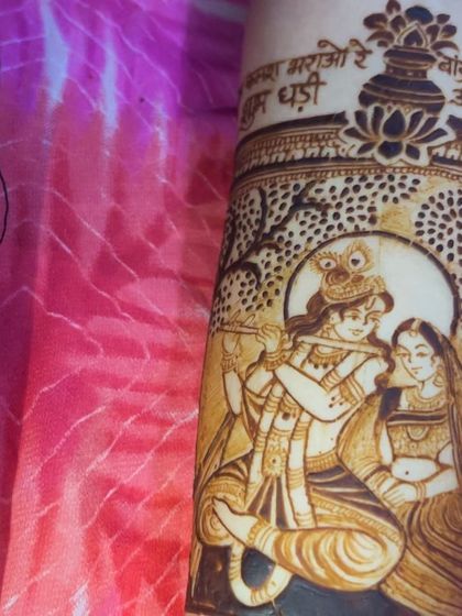 This design features a beautiful Radha Krishna portrait with a traditional 'kalash' motif above it.