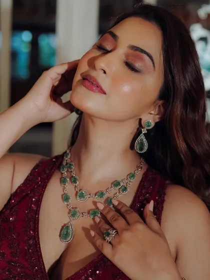 A glamorous look perfect for a Sangeet or party. This close-up shows the soft, smokey eyeshadow and radiant skin, creating a look that is both sultry and sophisticated.
