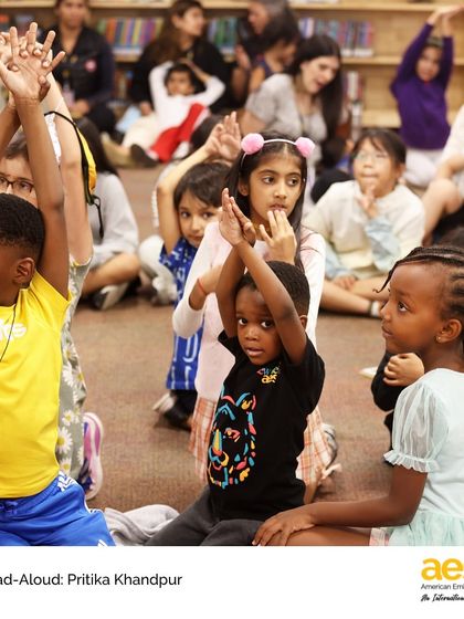 Students and parents participate in movements that go along with the story. Our library events are designed for the whole family, strengthening the home-school connection.