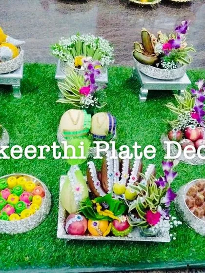 A lovely platter arrangement for a puberty ceremony in Gobichettipalayam. The German silver plates and stands add a touch of elegance to the traditional setup.