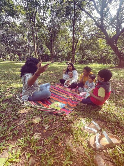 A series of photos from our 'Storyscapes 16' session, capturing the authentic, unposed moments of our circle. You can see children listening, playing, and interacting naturally, which is the essence of our child-led storytelling approach.